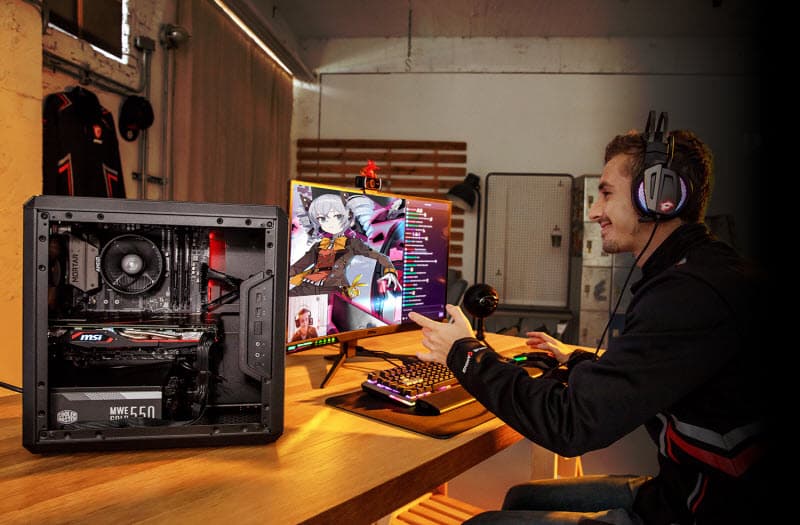 a man playing games with a complete MSI setup