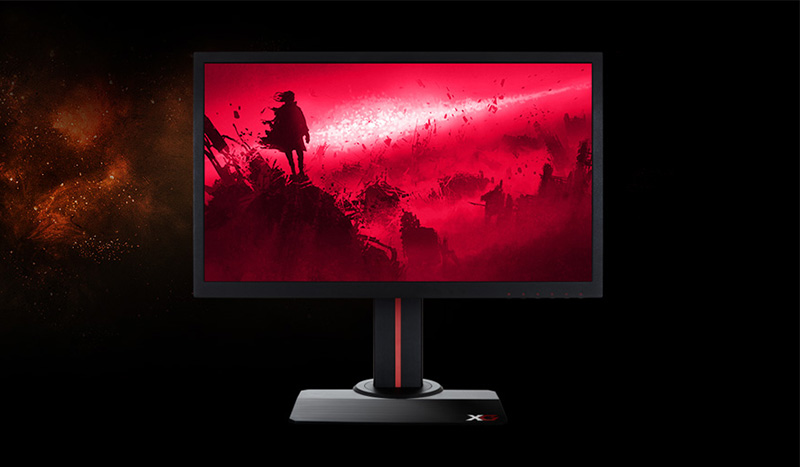 A monitor with a screenshot of a character in a world covered in red