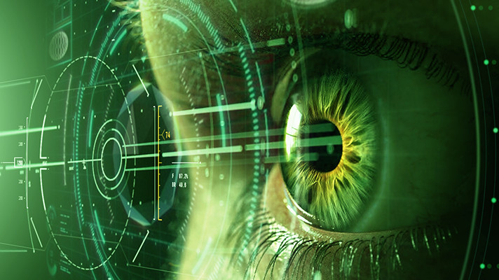 Green-Filtered Image of a Person's Eye Looking Through an AR Graphical Interface