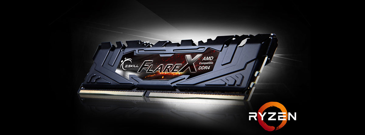 Flare X memory module in black heat spreader in standing position, angled slightly to the left, with a log of Ryzen next to it on the right