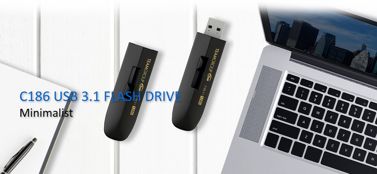 Team Group C186 USB 3.1 Flash Drives Next to an Open Laptop and Text That Reads: Minimalist