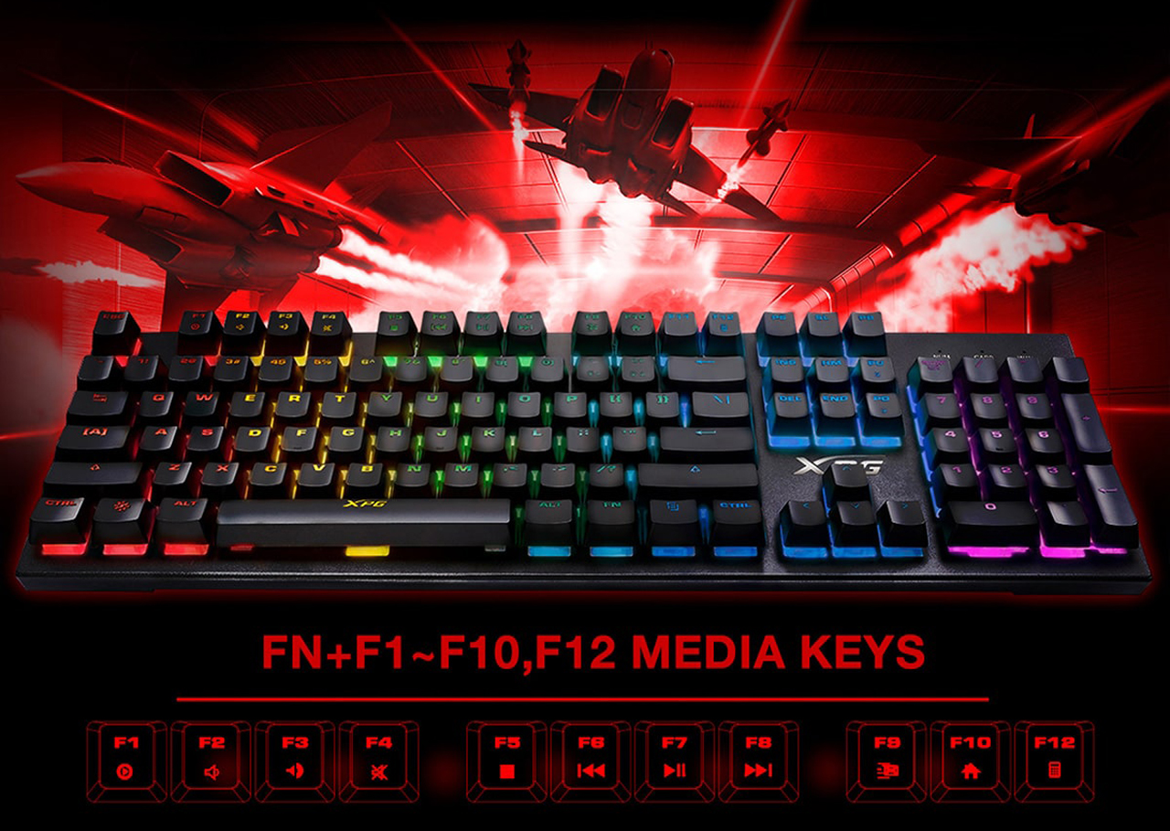 An illuminating keyboard is against a bombing in-game scene. Beneath it is all function and media keys on display.