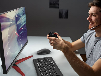 a man using a game controller to play games on the Acer KG281K bmiipx monitor