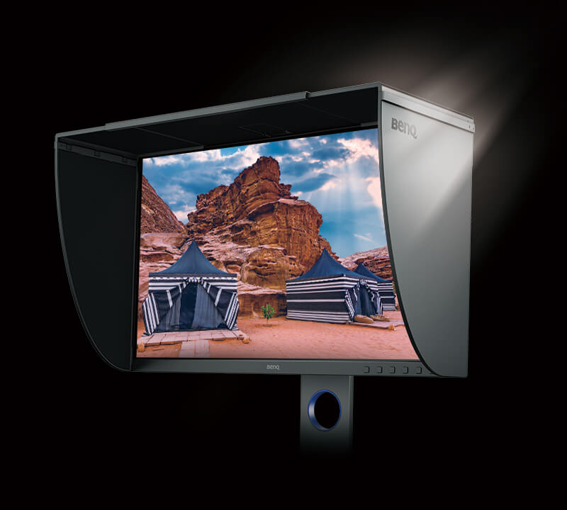 BenQ SW270C Monitor Angled to the Left, showing blue and white cabana tents in a desert canyon