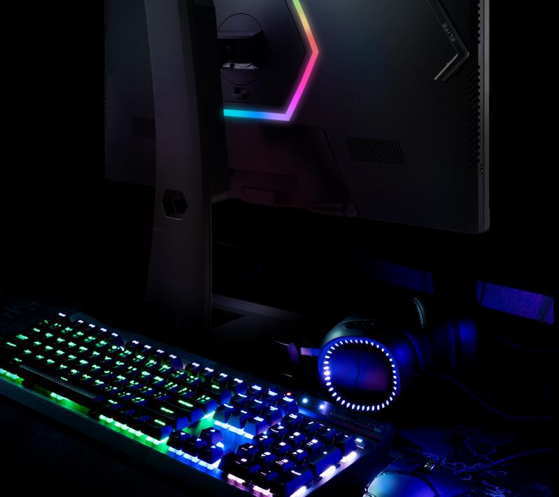 one keyboard and the back of monitor showing the effect of RGB lighting