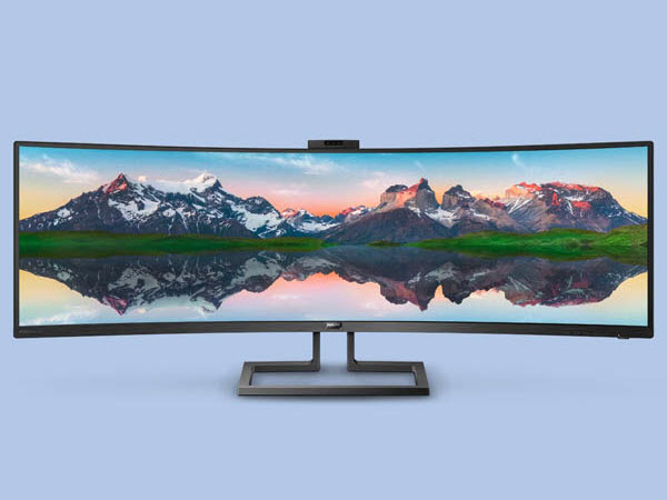 LG SuperWide Monitor Facing Forward Showing a Lakeside Mountain Range