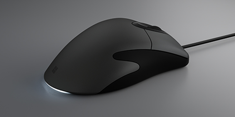 Microsoft Classic Intellimouse laying flat, facing up to the right
