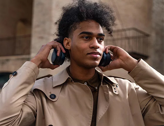 A boy wore the Sennheiser HD 450BT Wireless Around Ear headphones