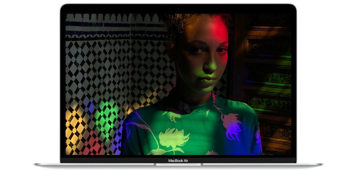 Retina Display of MacBook Air showing a woman under shadow and light