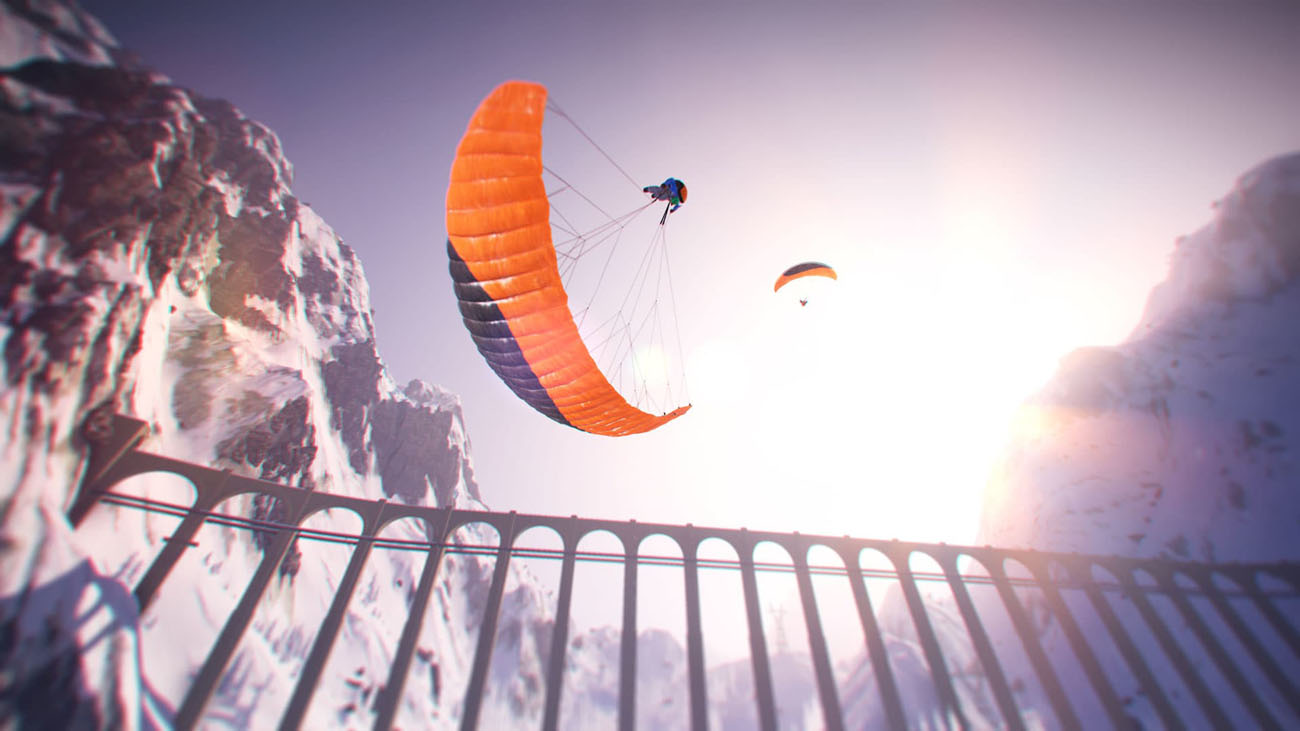 Steep Screenshot Showing Two Parachuters Going over a bridge between two snow-covered moutnains