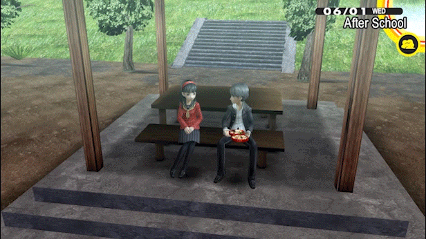 A girl and a boy are sitting on a bench in a park, and are talking about something.
