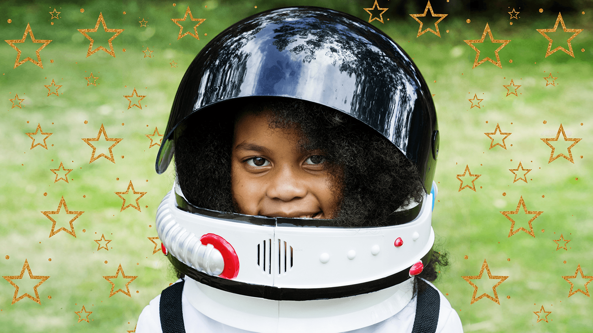 A girl with a helmet put on and a pattern of star fills the picture