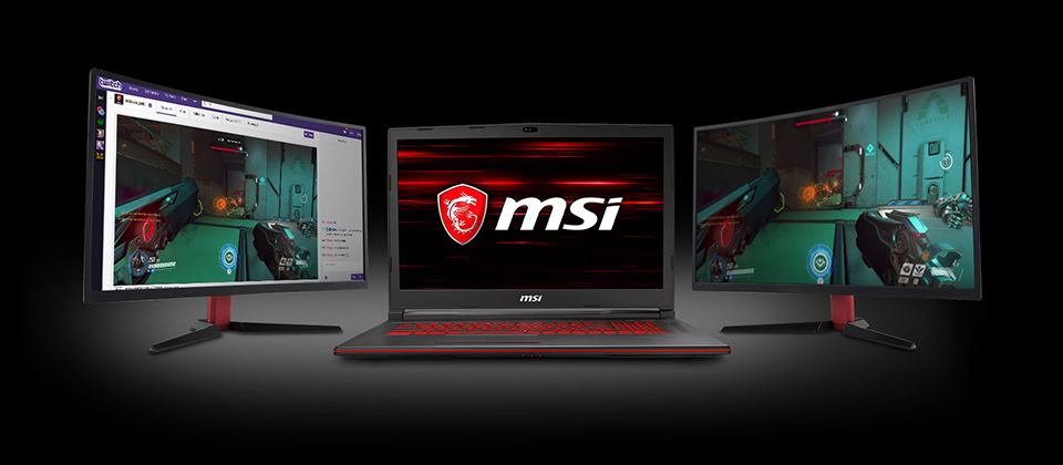Gigabyte GL73 Gaming Laptop Open, Facing Forward with the MSI Logo as Its Screenfill, to the left and right of the laptop are monitors angled towards the laptop. The left monitor shows a twitch stream with the streamer playing Reaper from Overwatch, the right monitor shows the actual Overwatch gameplay