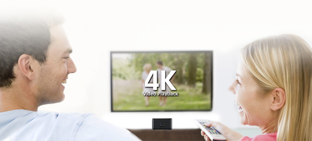 a couple is watching a TV with 4K effect