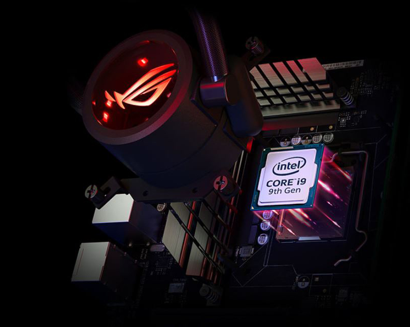 Intel Core i9 processor is lifted up above the illuminated motherboard.