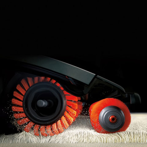 Closeup side view of the Shark vacuum's brush rollers