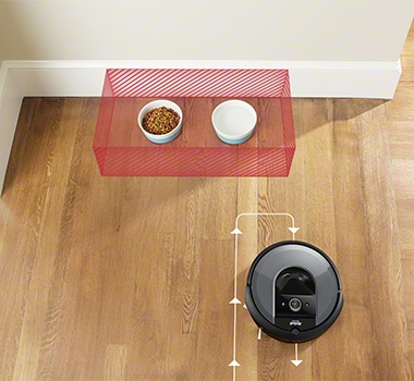 iRobot Roomba i7+ is navigating out of the way of objects.