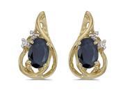 Diamond and 6 x 4 MM Oval Shaped Sapphire Earrings in 14K Yellow Gold 1 20 cttw