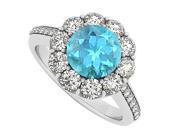 14K White Gold December Birthstone Created Blue Topaz and Cubic Zirconia Halo Engagement