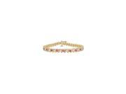 Created Pink Sapphire and Cubic Zirconia S Tennis Bracelet 14K Yellow Gold 5.00 CT TGW