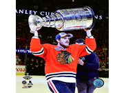 Andrew Shaw with the Stanley Cup® Game 6 of the 2015 Stanley Cup® Finals Size 8 x 10