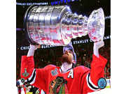 Duncan Keith with the Stanley Cup® Game 6 of the 2015 Stanley Cup® Finals Size 8 x 10