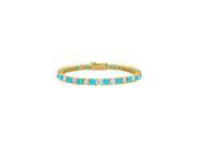 Created Blue Topaz and CZ Tennis Bracelet in 18K Yellow Gold Vermeil. 5 CT. TGW. 7 Inch