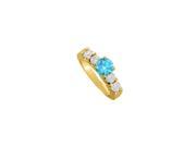 December Birthstone Created Blue Topaz and CZ Elegant Engagement Ring in Yellow Gold Att