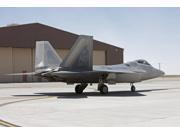 An F-22 Raptor taxi's to the runway for a training mission Poster Print (34 x 22) An F-22 Raptor taxi's to the runway for a training mission Poster Print (34 x 22)