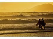Body surfers walk in the water on the coast of Kodiak Island during late afternoon Pasagshak State Park Kodiak Island Alaska Poster Print (19 x 12) Body surfers walk in the water on the coast of Kodiak Island during late afternoon Pasagshak State Park Kodiak Island Alaska Poster Print (19 x 12)