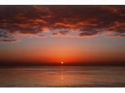 A layer of clouds is lit by the rising sun over Rio de la Plata, Buenos Aires, Argentina Poster Print (34 x 22) A layer of clouds is lit by the rising sun over Rio de la Plata, Buenos Aires, Argentina Poster Print (34 x 22)