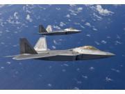 Two F-22 Raptors fly in formaton during a training mission Poster Print (17 x 11) Two F-22 Raptors fly in formaton during a training mission Poster Print (17 x 11)