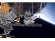 Astronaut participates in extravehicular activity Poster Print (16 x 11) Astronaut participates in extravehicular activity Poster Print (16 x 11)