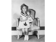 Shirley Temple sitting on Chair with a Doll in White Dress Photo Print (8 x 10) Shirley Temple sitting on Chair with a Doll in White Dress Photo Print (8 x 10)