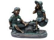 Girl and Boy Playing on Teeter Totter Statue