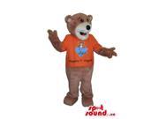 Brown Bear Forest Canadian SpotSound Mascot Dressed In An Orange T Shirt With Logo