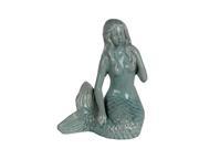 Glossy Blue Ceramic Sitting Mermaid Statue 9 1 2 Inches Tall