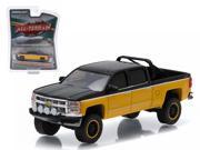 2015 Chevrolet Silverado 1500 Black and Yellow Pickup Truck All Terrain Series 2 1 64 Diecast Model by Greenlight