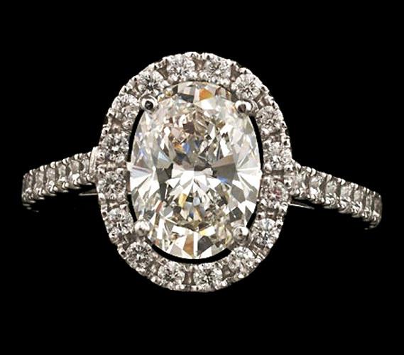 3.25 ct. oval center halo diamond wedding ring gold