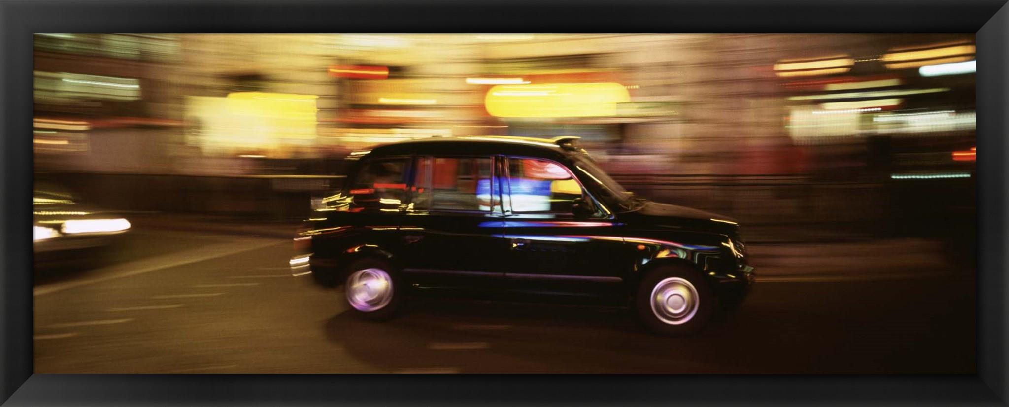 England, London, Black cab in the night by Panoramic Images Framed Art, Size 38 X 14